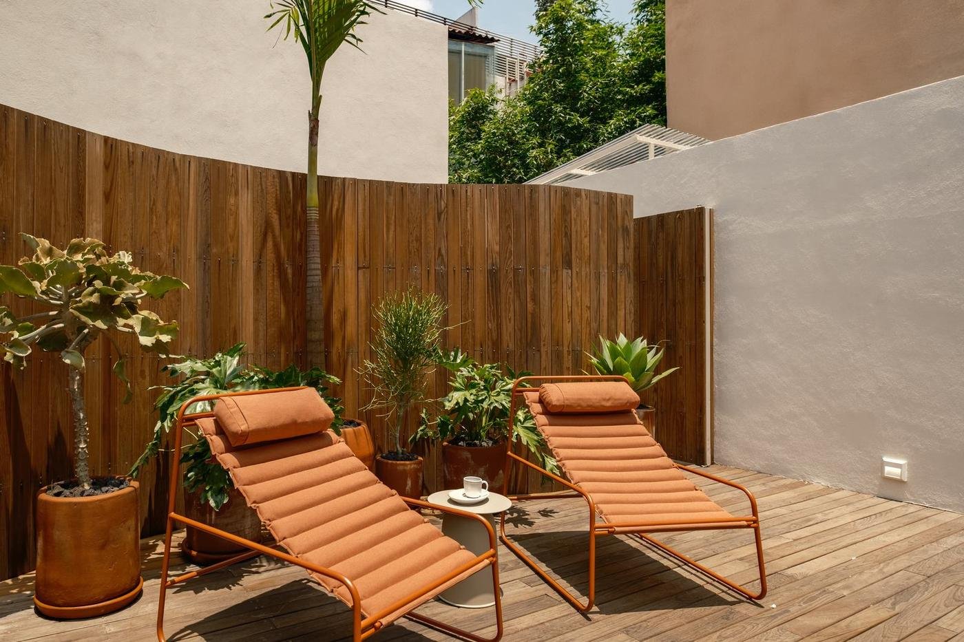 Rooftop lounge chairs at Cholula Condesa